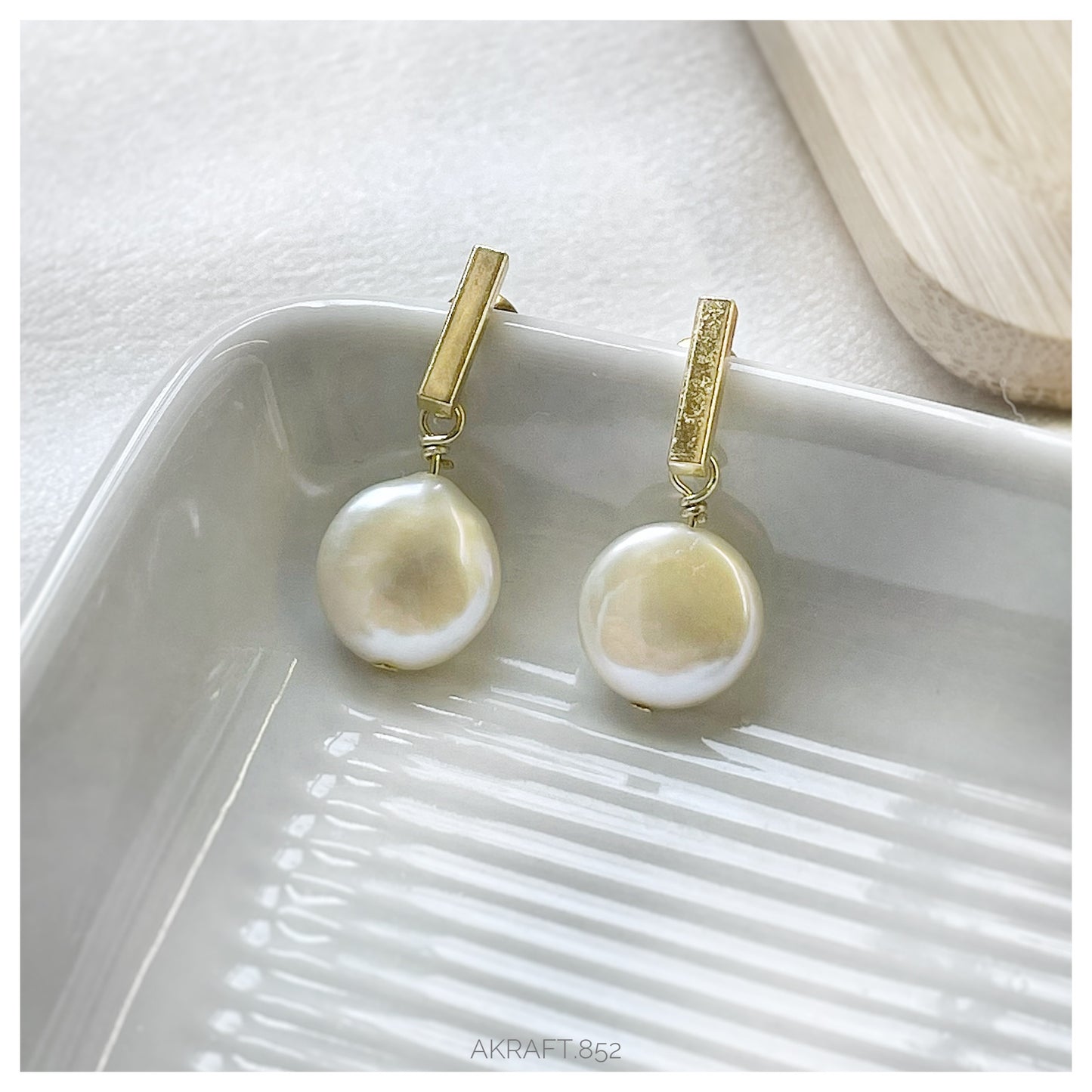 Flattened-sphere single Baroque Freshwater Pearl Earrings